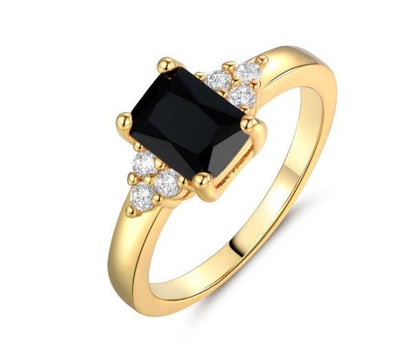 ANNA | Sort spinell-baguette-ring i gull
